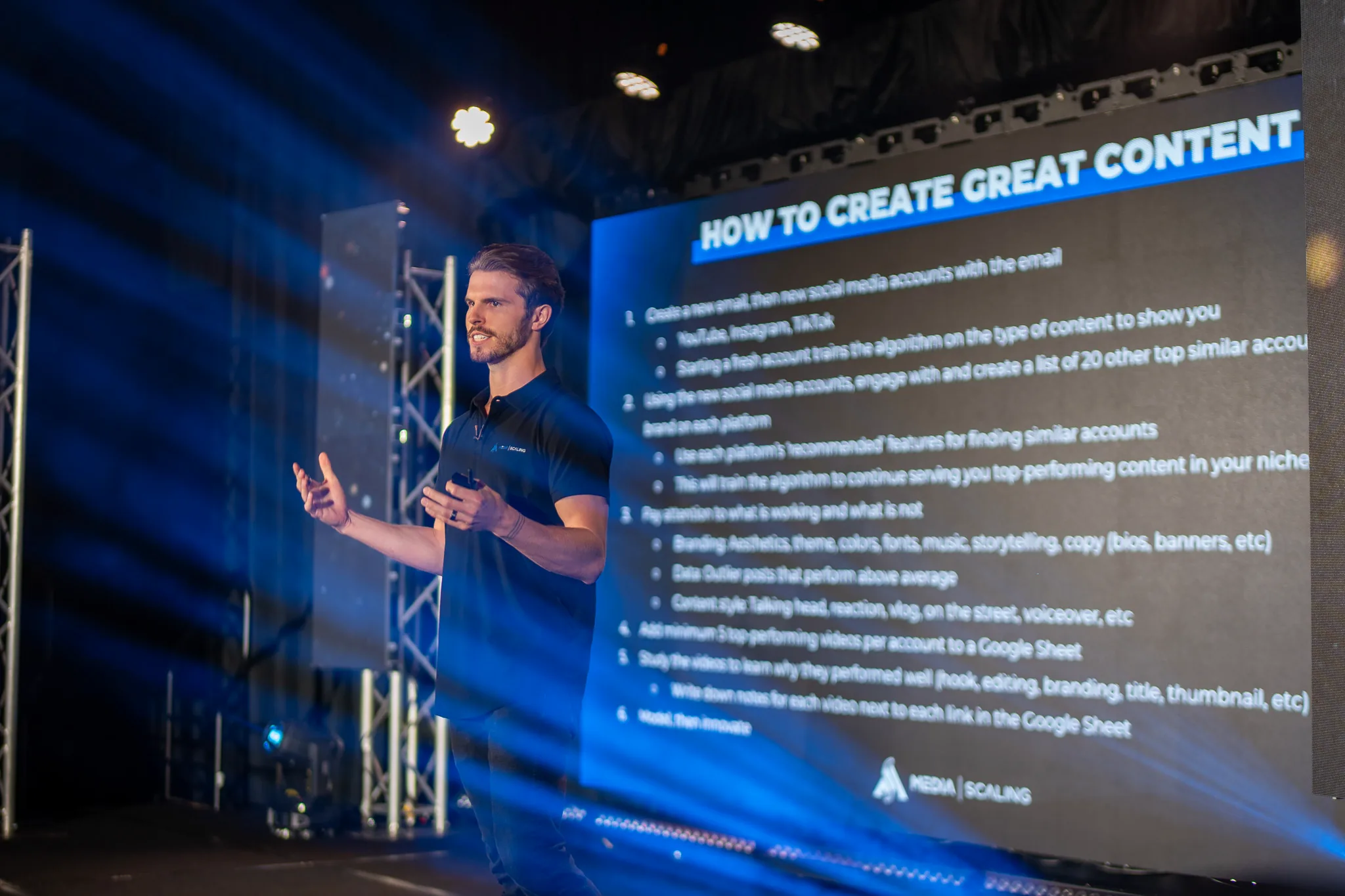 A speaker breaking down how to create great content on the CreatorHub main stage
